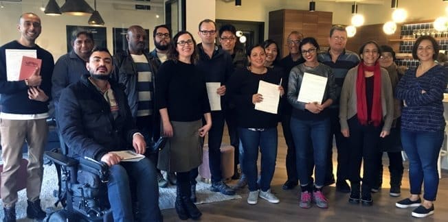 My Roots workshop participants holding their certificates