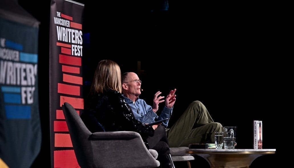 An author in conversation on stage at a Vancouver Writers Fest special event